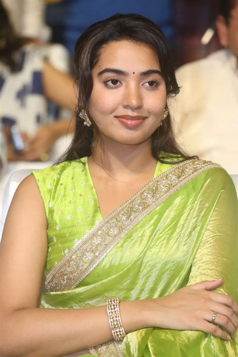 Shivathmika Rajashekar in Green Saree Sleeveless Blouse